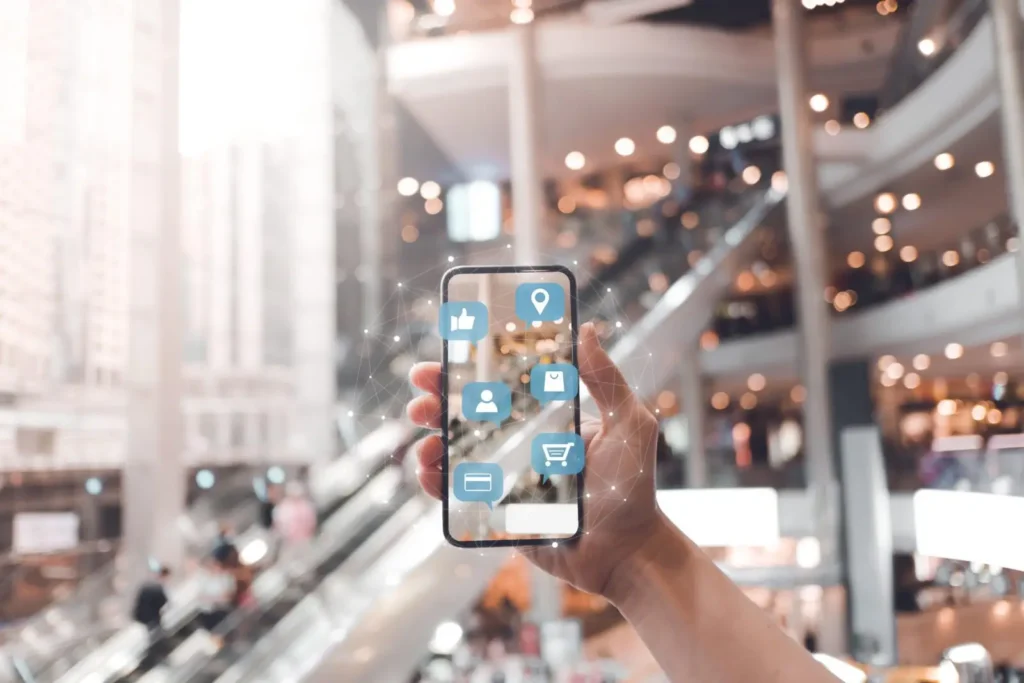 woman shopping in mall with a mobile phone