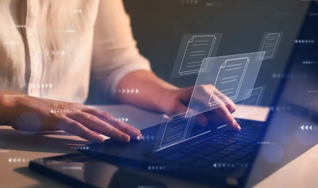 woman on computer managing product catalogs