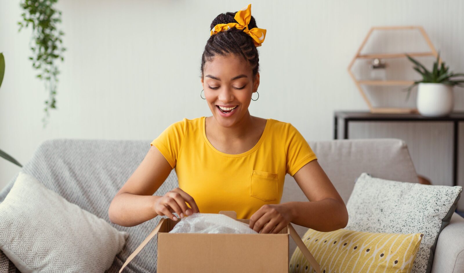 Woman opening a package