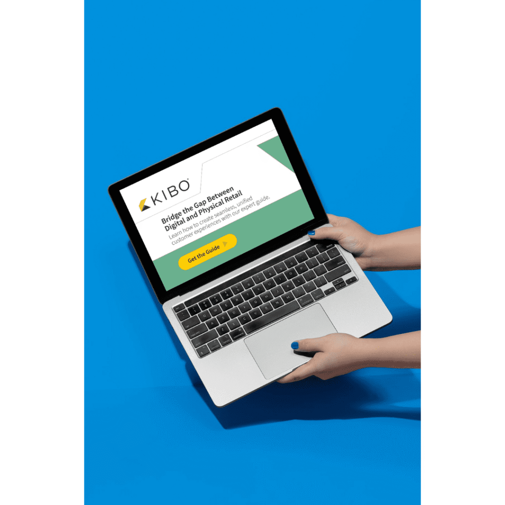 person holding up a laptop