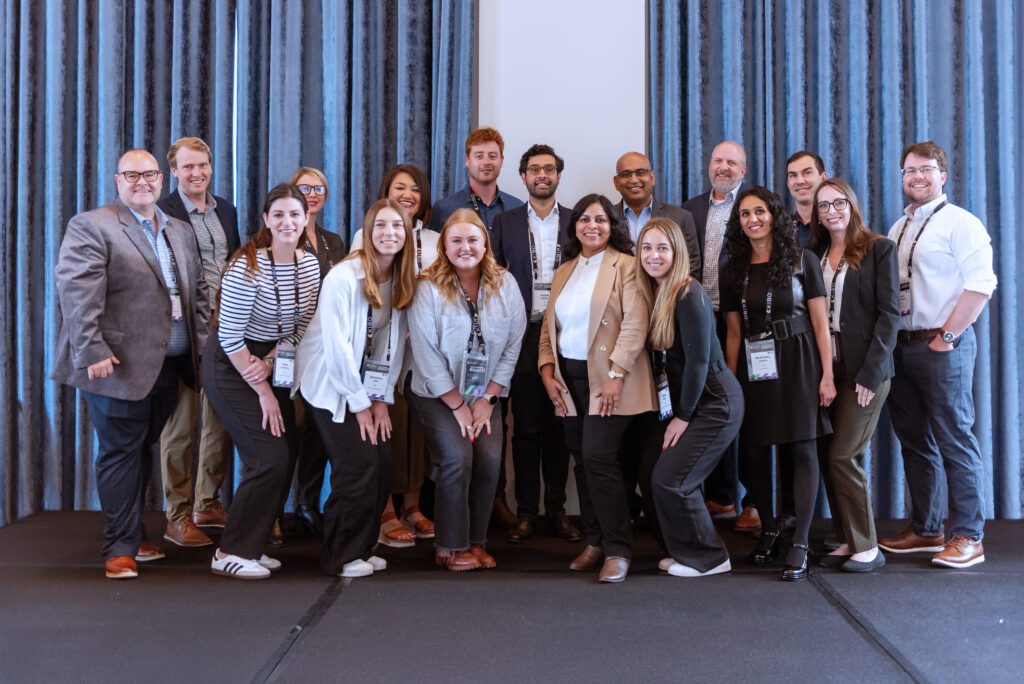 an image of kibo employees at an event focused on composable commerce